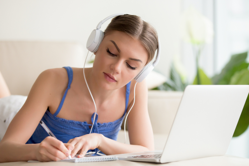 girl studying on laptop in emt school