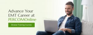 Man smiling while signing up for EMT training courses